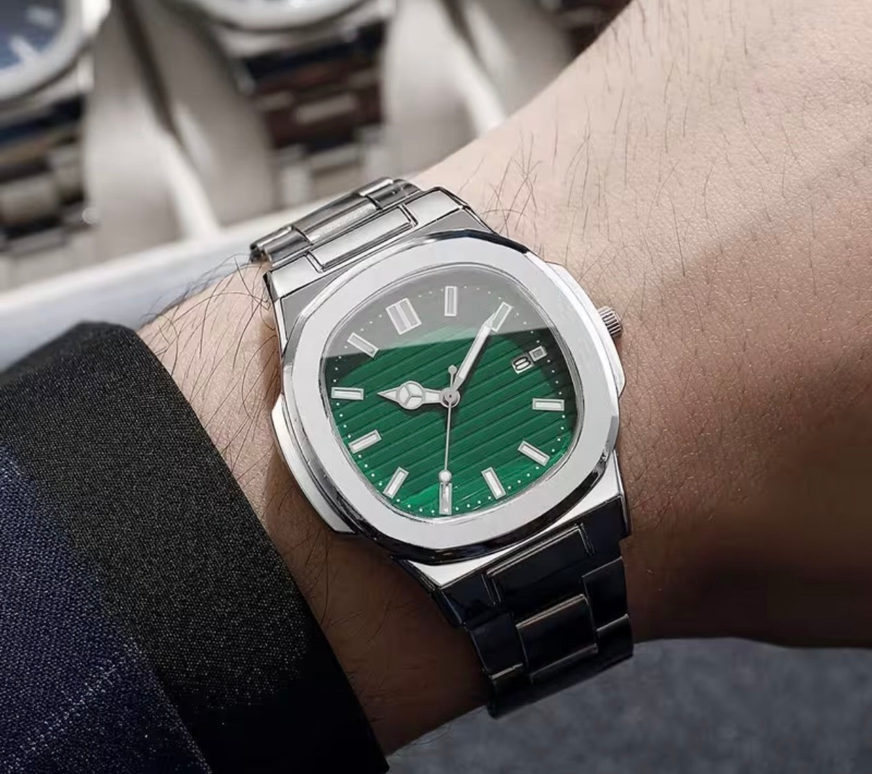Emerald Nautilus Watches