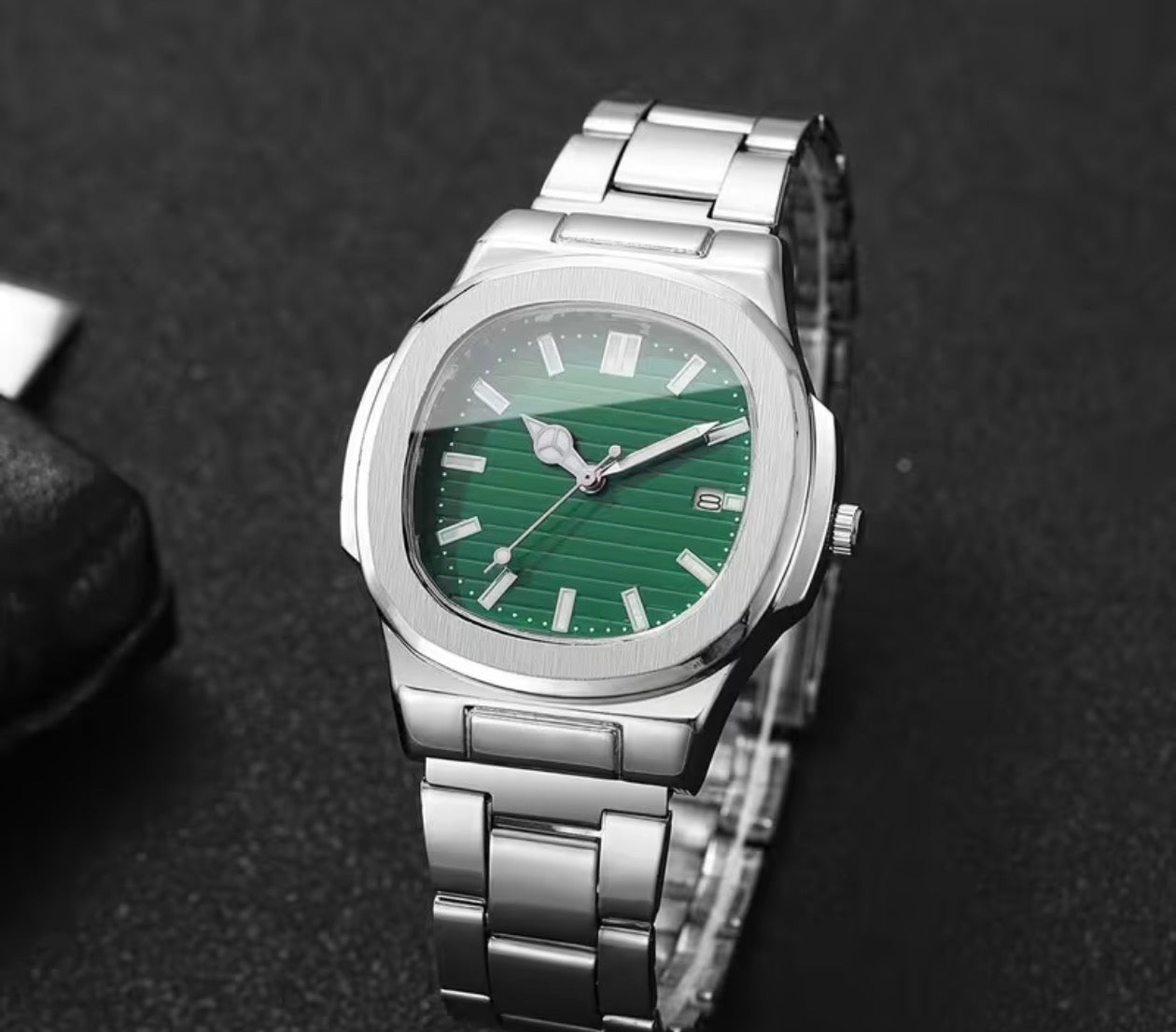 Emerald Nautilus Watches
